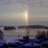 The winter rainbow over the lake