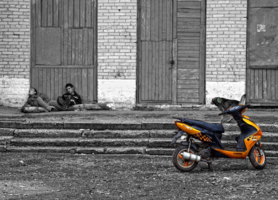 Оранжевый скутер
