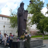 У памятника Сергию Радонежскому.