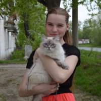 Юлия с своей кошкой "Соней"
