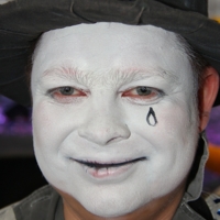 Мягкая улыбка Грустного клоуна